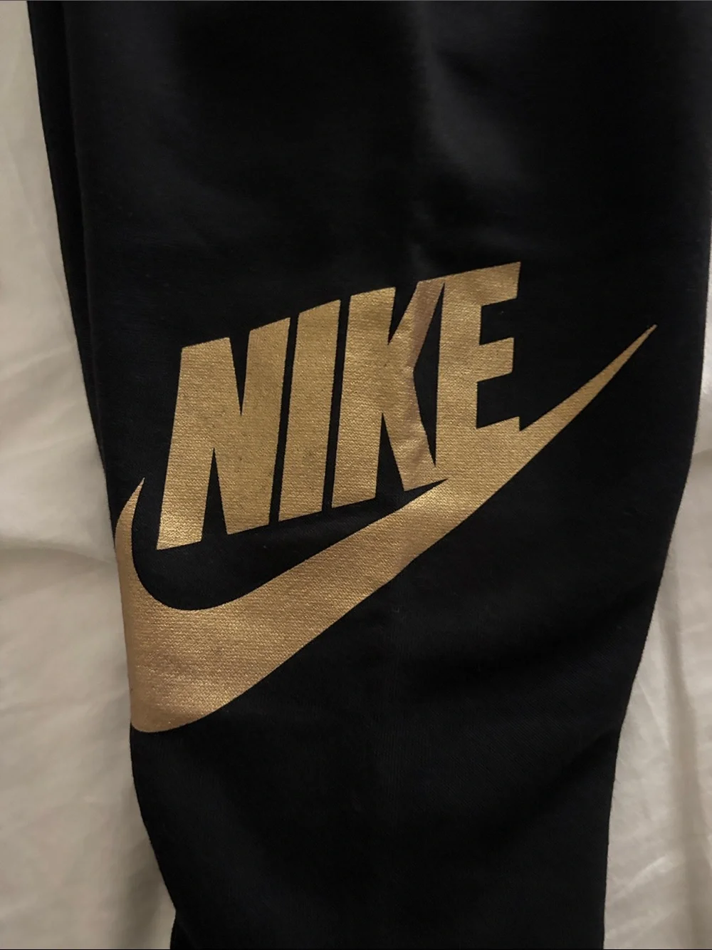 Nike Kids Black Joggers with Metallic Gold Logo